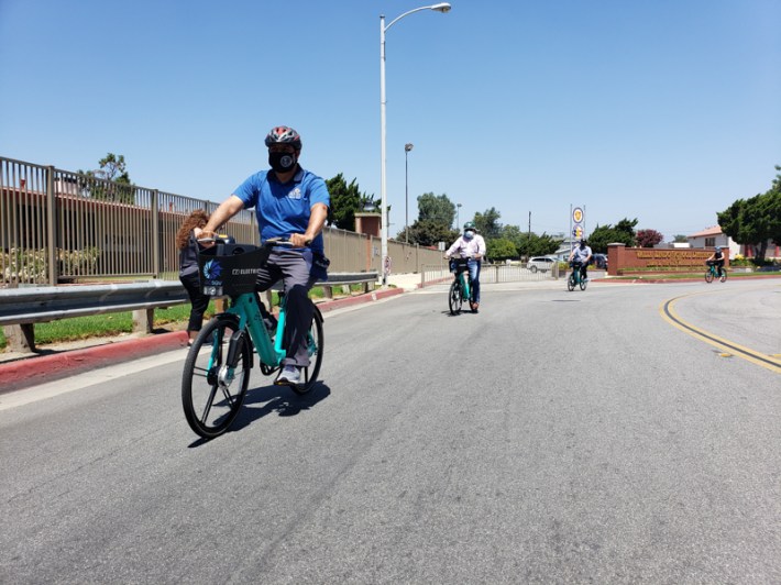 South El Monte council members Manuel Acosta (from left) and Richard Angel test the newly launched GoSGV electric pedal assist bike share in the City of South El Monte. Kristopher Fortin/Streetsblog La