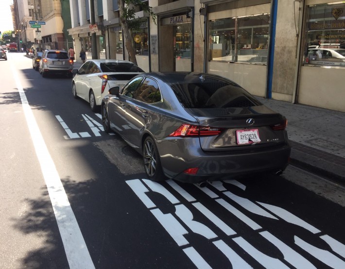 Cars parked in the 6th Street bus lane today