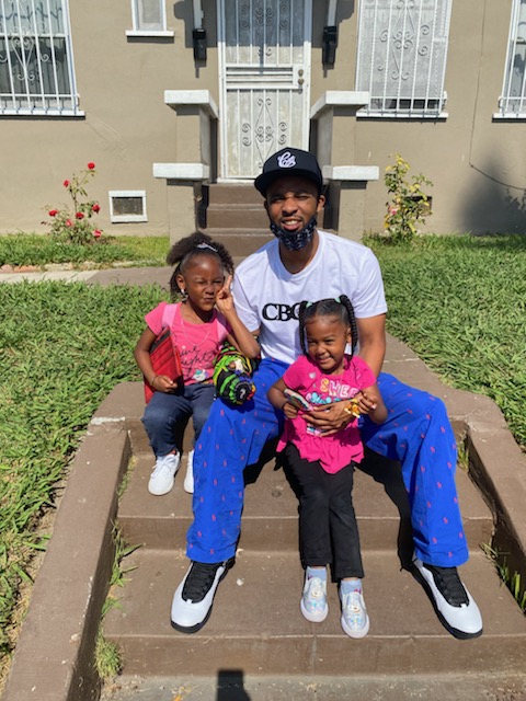 Jermaine Welch hangs out with his daughters. They cried when they
