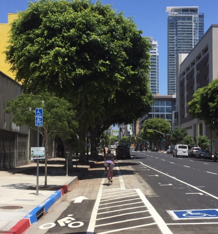 The new Olive Street protected bike lanes extend from Pico to 7th