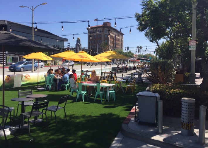 Barricades used to create expanded outdoor dining areas in downtown Culver City