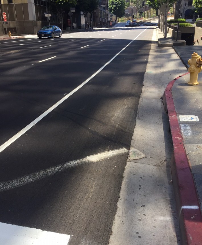 6th Street between Figueroa and Flower Streets. Again the fog line makes it clear that there could have been a bike lane.