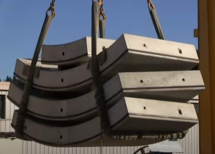 Pre-cast concrete tunnel liners used in TBM tunnel construction - via YouTube