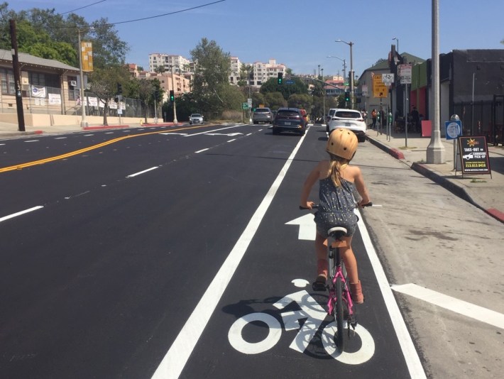 New bike lane on Figueroa Street in Chinatown (author's daughter pictured)