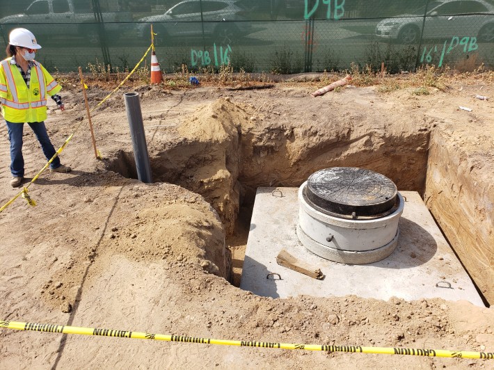 The cover of a filtration. Water will get cleaned by multilpe filtration units before it enters into the drywell roughly 100 feet deep. Kristopher Fortin/Streetsblog LA