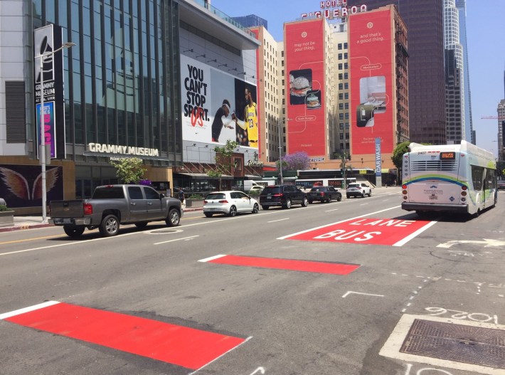 The Figueroa bus lane markings pass by Staples Center and L.A. Live