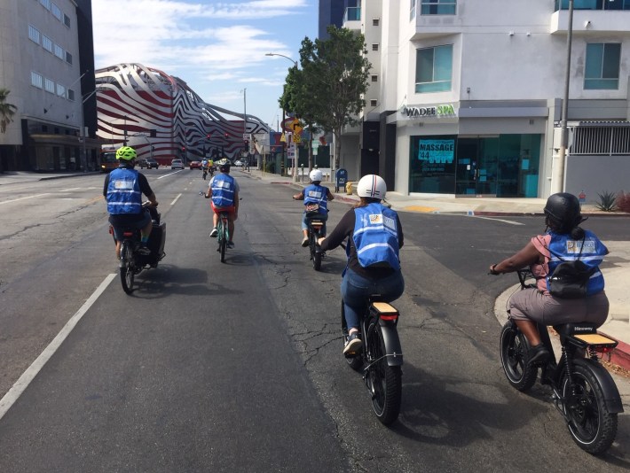Ride participants take the lane on Fairfax