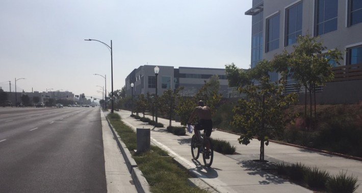 New sidewalk level protected bike lane on Hollywood Way
