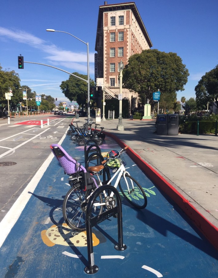 Some of the painted areas include bicycle parking