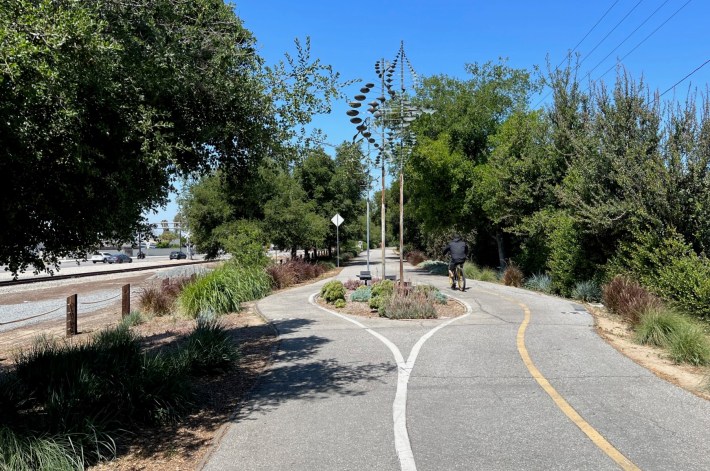 The existing Whittier Greenway Trail is in a landscaped ~60-foot wide former rail right-of-way