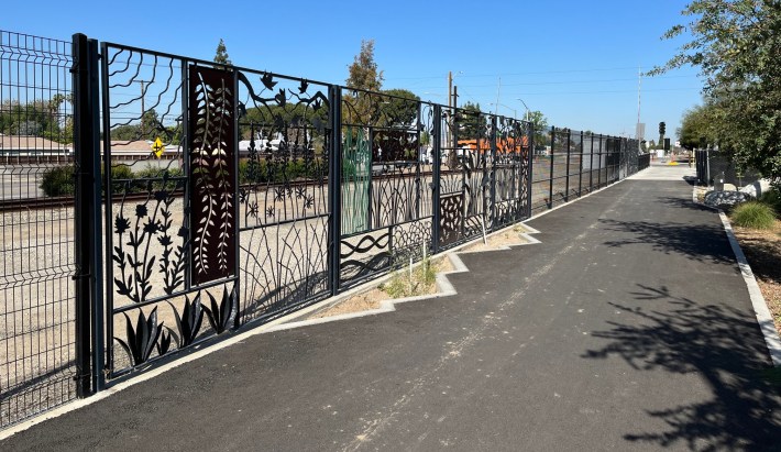 Artistic fencing panels at Whittier Greenway's Oak Station