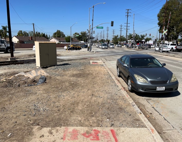 The trail includes adding wheelchair accessible sidewalks extending across the rail tracks to Lambert. Above is a before image of the currently missing sidewalk.
