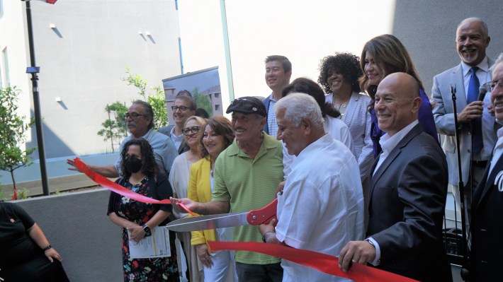 The Ortiz siblings (left) with Rosa Pena of La Historia, and Paul Chavez (right) cut the ceremonial ribbon at the grand opening of Plaza Ortiz 1 in El Monte, CA. Credit: Chris Greenspon/Streetsblog