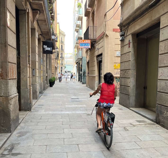 In the oldest part of Barcelona, narrow walk streets are shared by pedestrians and relatively slow-moving cyclists.