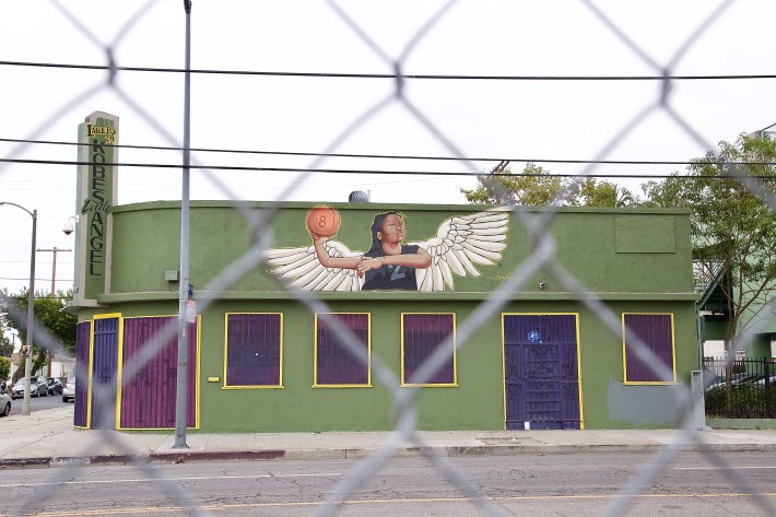 A tribute to Gianna Bryant graces the former home of People Who Care Youth Center at Slauson and Halldale. The organization was founded in 1974 by residents concerned about the lack of positive activities and outlets for youth along the corridor and was led for over 25 years by Connie Watson. Frustrated but undaunted by the scarcity of funding for such efforts, she led the organization until she succumbed to illness. Watson passed in 2016 at age 65. Sahra Sulaiman/Streetsblog L.A.