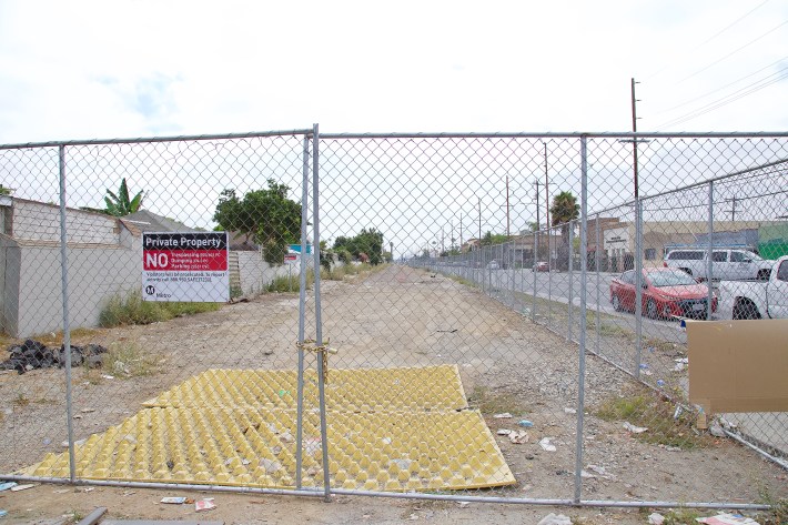 View of the Slauson corridor right-of-way (ROW) looking eastward. In the first phase of the project, this ROW will be transformed into a 5.5-mile bike/walk path featuring shade trees, drought-tolerant landscaping, lighting, and improved intersection crossings. Sahra Sulaiman/Streetsblog L.A.