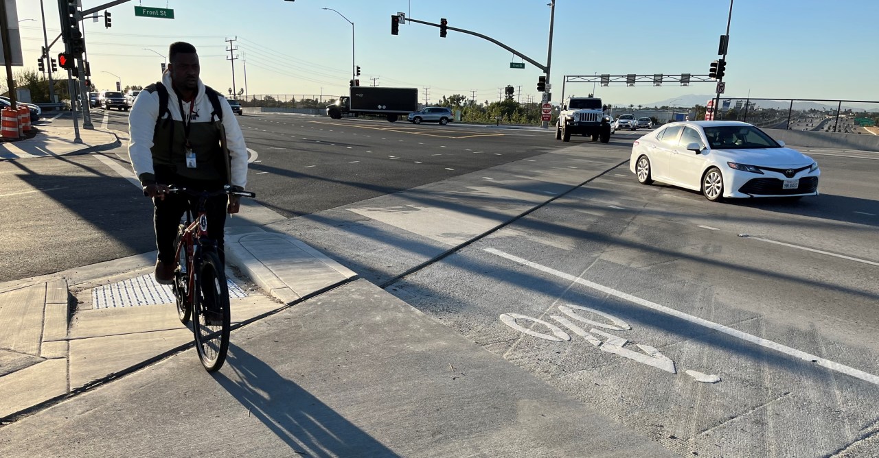Cyclist using Burbank Blvd Bridge sidewalk, instead of adjacent bike lane