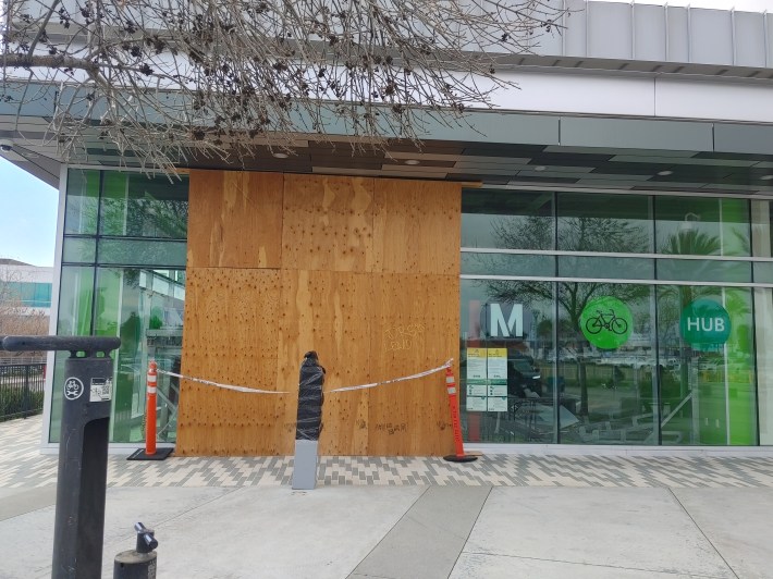 The boarded up exterior of the El Monte Metro Bike Hub, which was crashed into by a motorist in September 2021. Credit: Chris Greenspon/SBLA