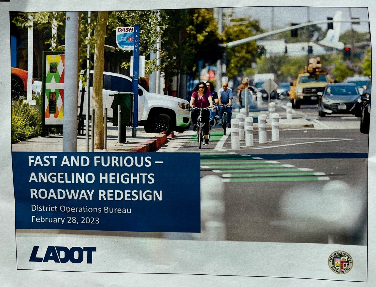 LADOT handout cover shows a protected bike lane, though no bike features are included in the proposed design