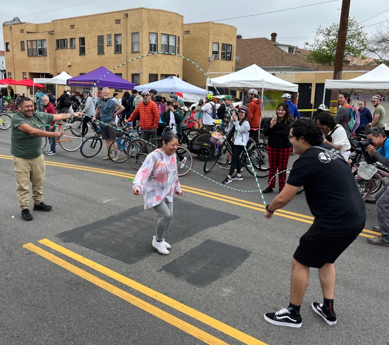 CicLAvia participants engaged in Double Dutch jumproping at the Arlington Heights hub