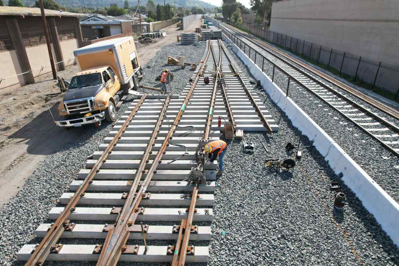 Crews constructing crossovers for the light rail track system in Glendora. Courtesy of Foothill Goldline Construction Authority