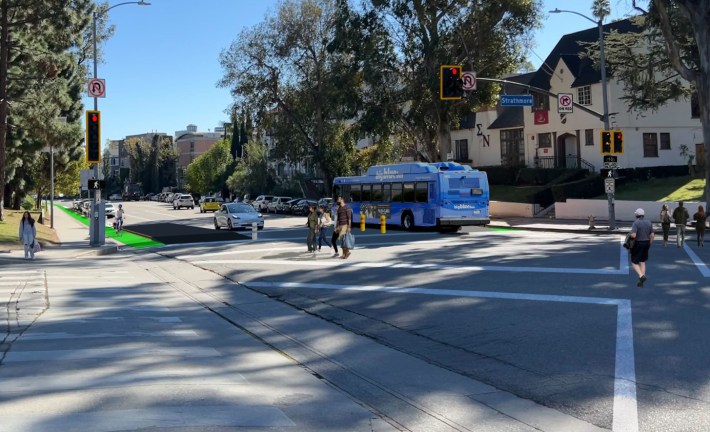 Westwood Connected rendering of Gayley Avenue with scramble crossing and protected bike lanes - via campaign website